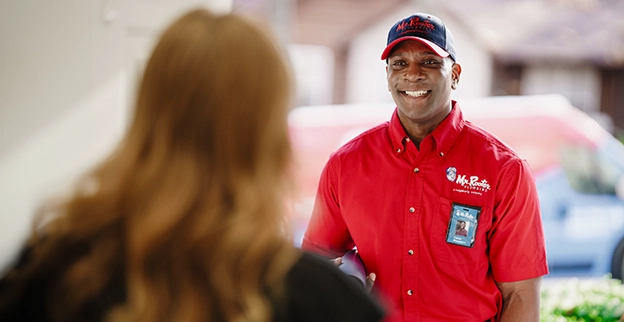 Mr. Rooter plumber showing up to a customer's house.