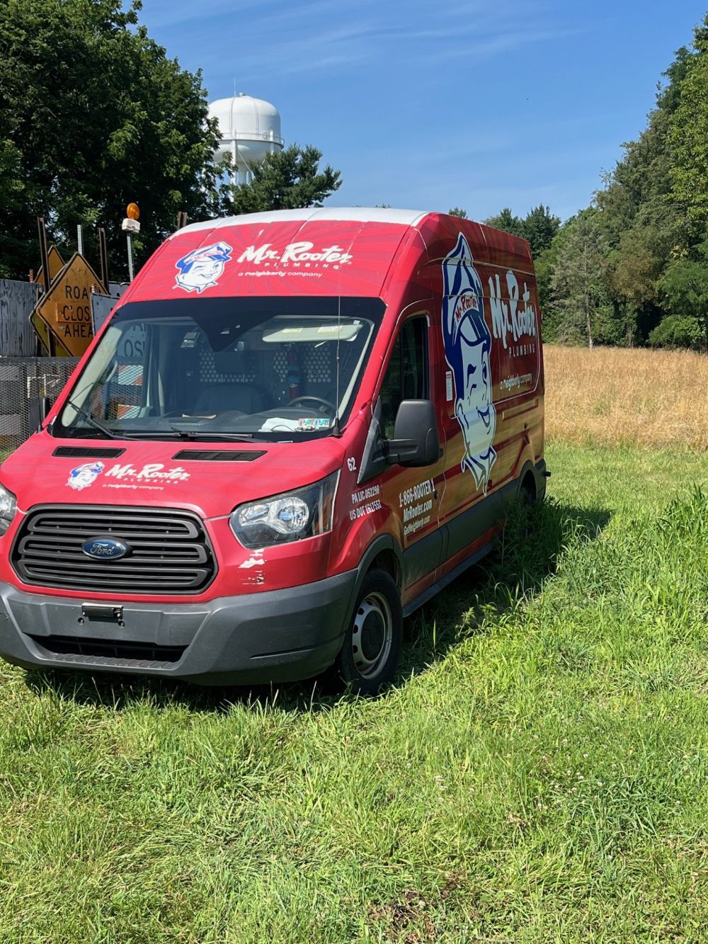 Red Ford Mr. Rooter Van