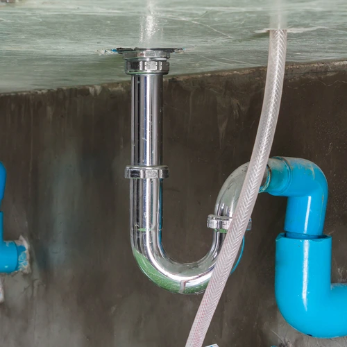 P-trap showing how the trap seal prevents sewer gas and odors.